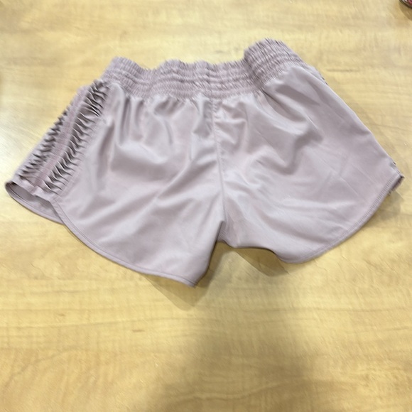 Ladies size small MPG running shorts in a blush rose color - Picture 2 of 3